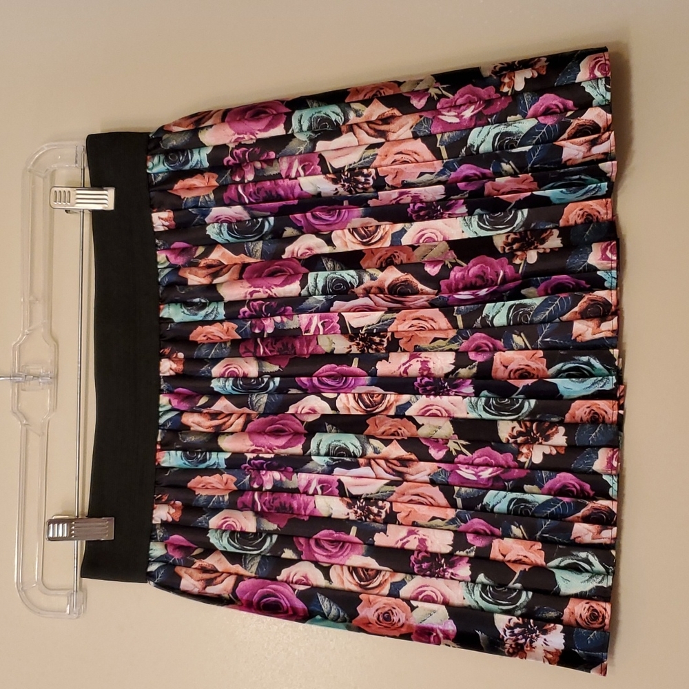 New, never worn skirt with multi colored roses